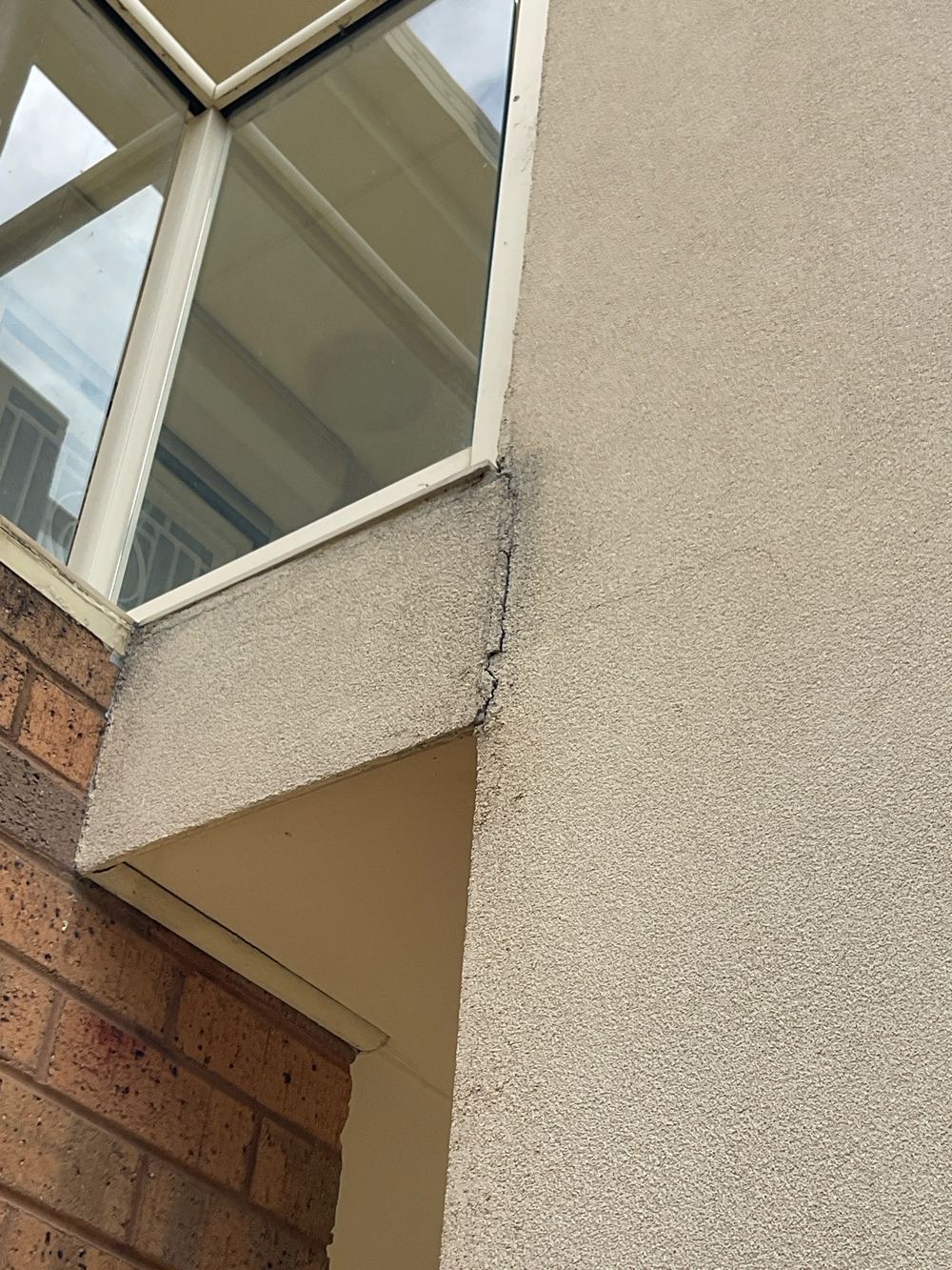 Minor movement cracking in an external wall, referred to an engineer, found during a pre-purchase inspection in Sunshine North