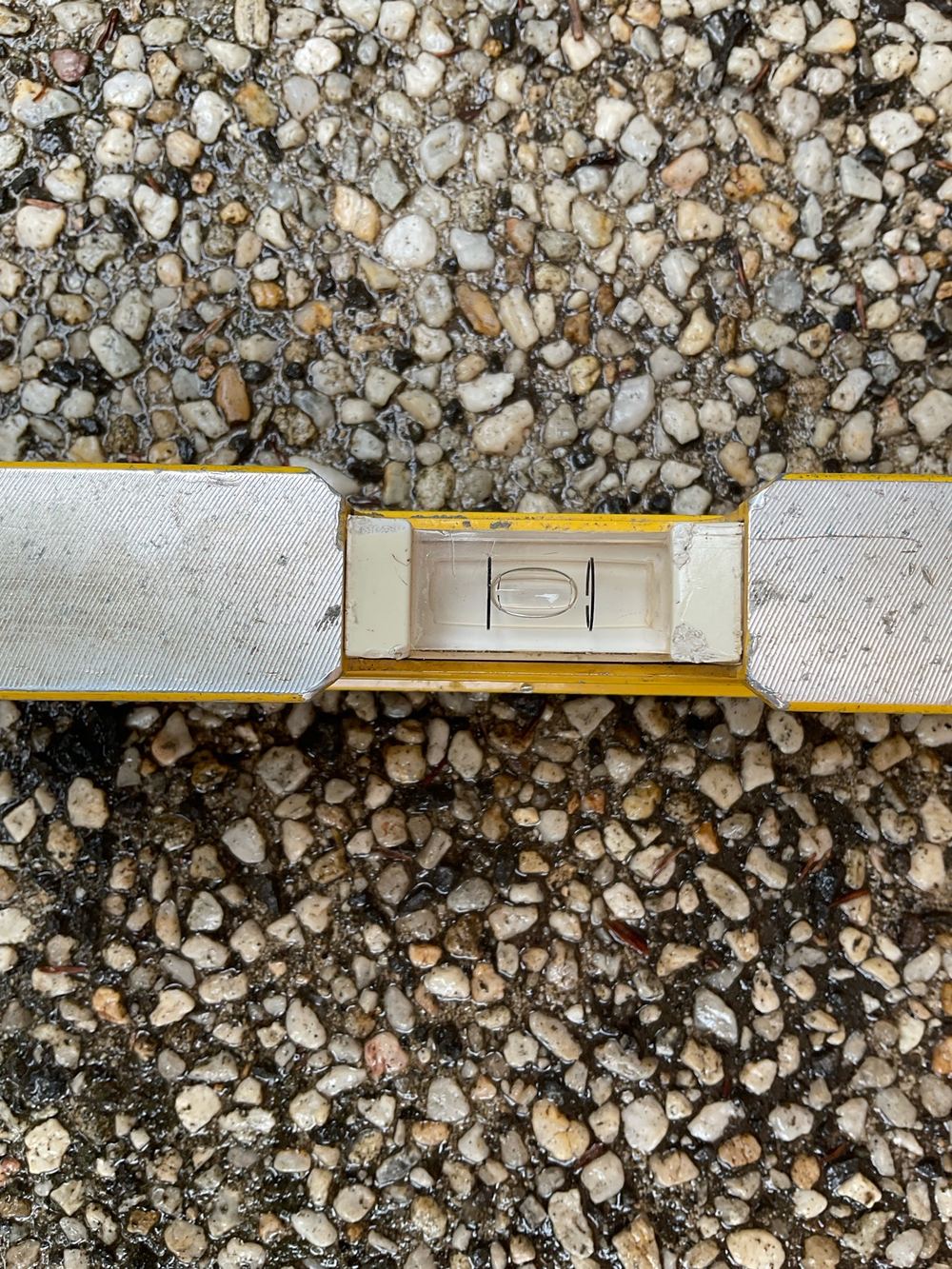 Surface grading toward the home beside a drainage grate, Sunshine North, Werribee