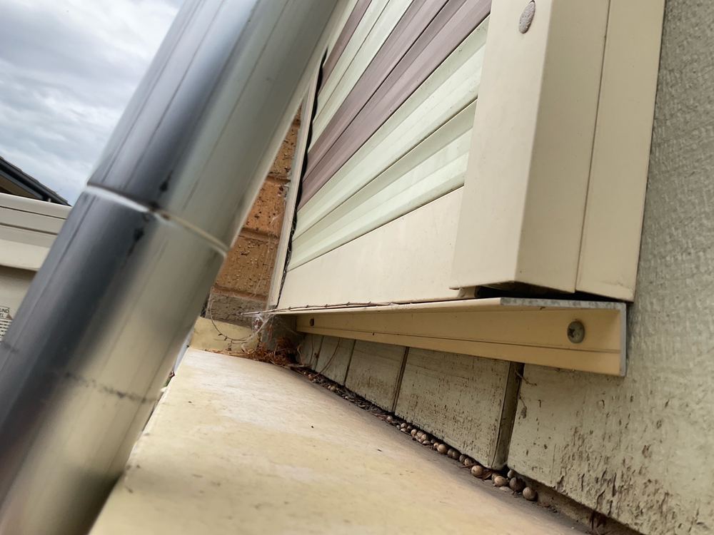 Parapet flashing sloping toward the building, so water runs inward, Sunshine North, Werribee