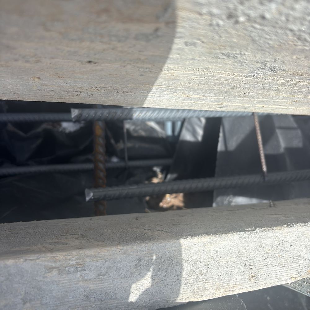 Tears in the vapour barrier left open instead of patched and taped, found during a slab pre-pour inspection in Werribee