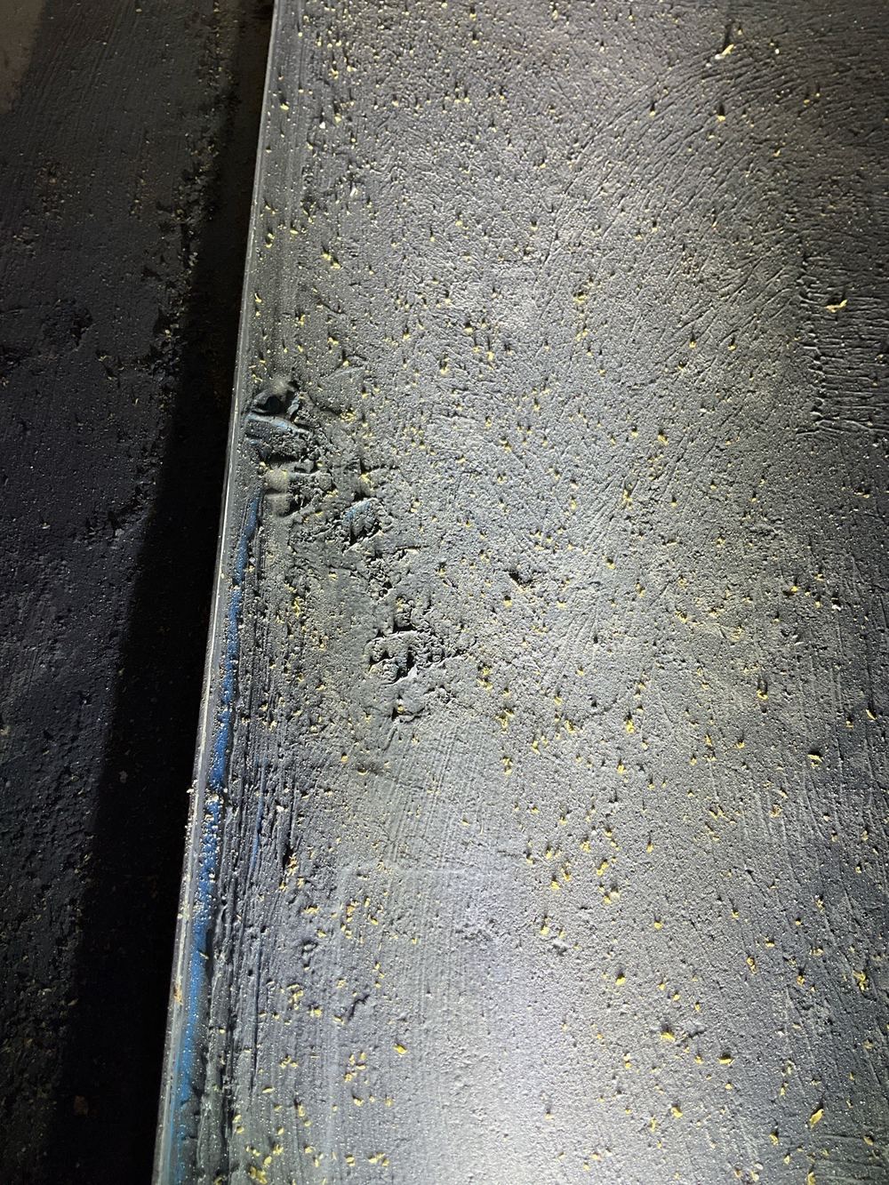 Torn wet area membrane needing repair before any tile goes down, found during a waterproofing inspection in Werribee